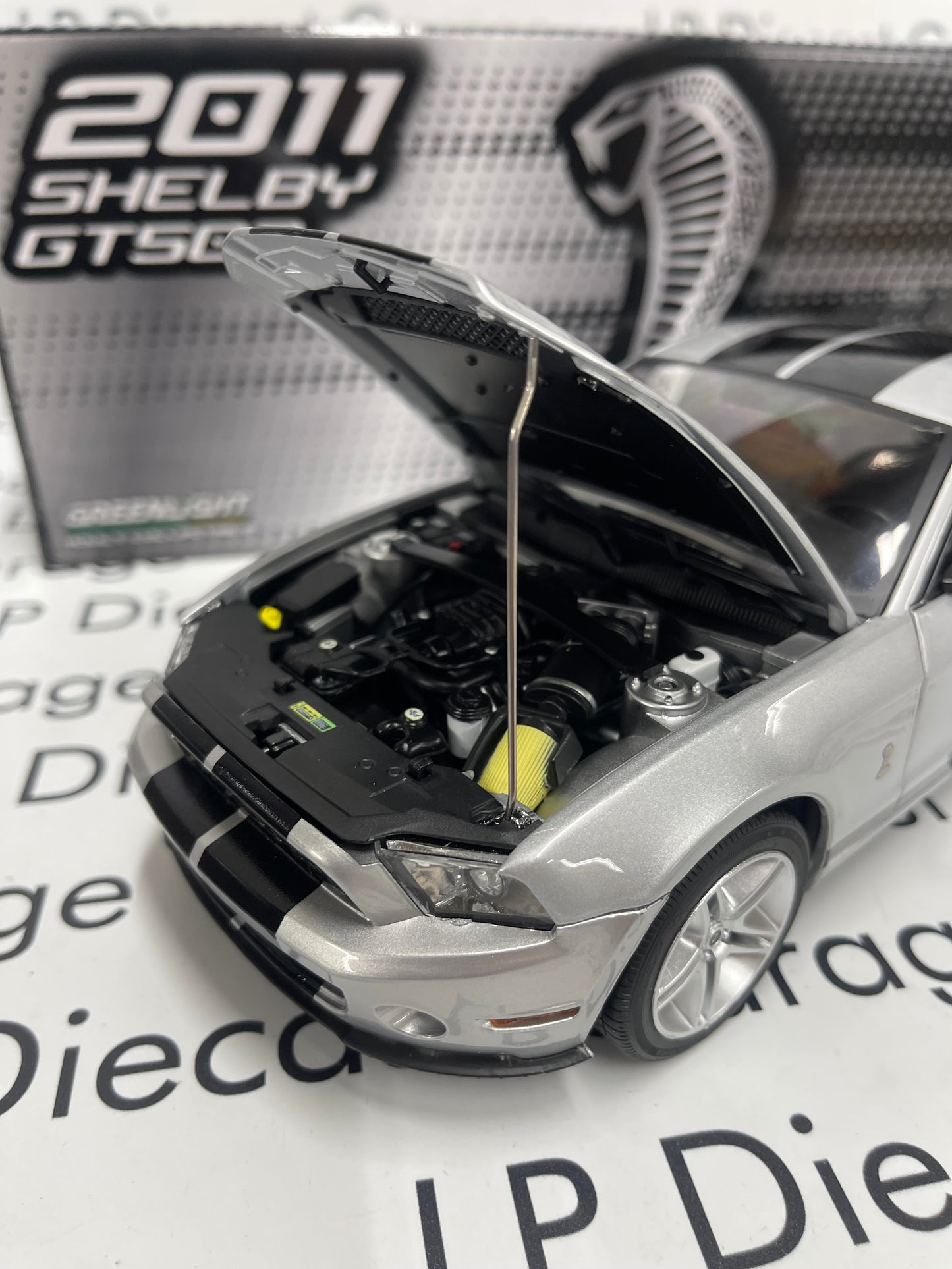 GREENLIGHT 2011 Ford Mustang Shelby GT500 Ingot Silver with Black Stripes 1:18 Diecast