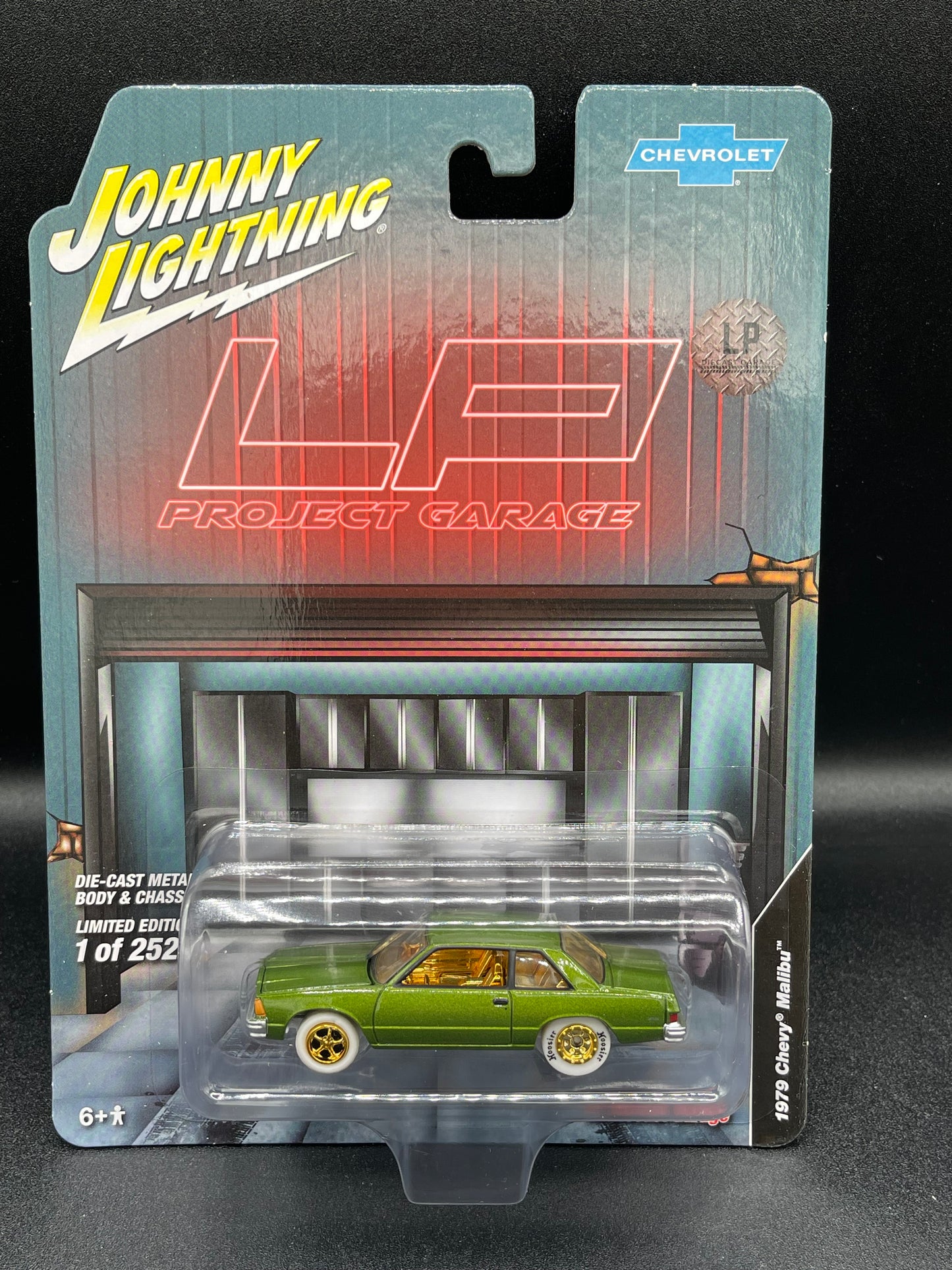 JOHNNY WHITE LIGHTNING Chase 1979 Chevrolet Malibu Jungle Green LP Diecast Garage Exclusive 1:64 Diecast Promo