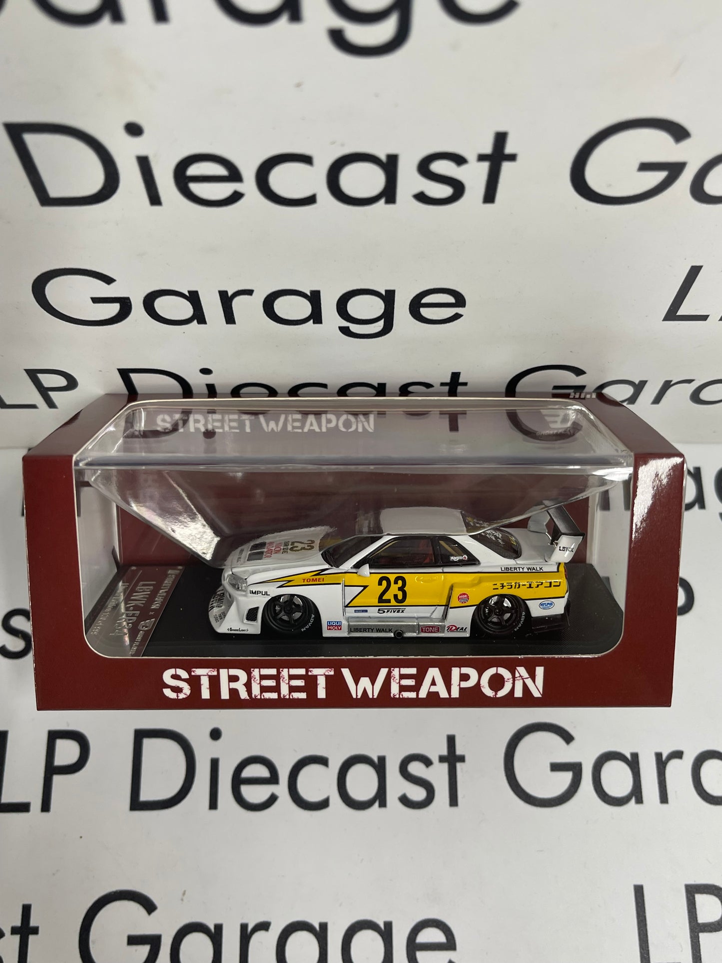 STREET WEAPON Nissan Skyline LBWK-ER34 White/ Yellow 1:64 Diecast Ghost Player