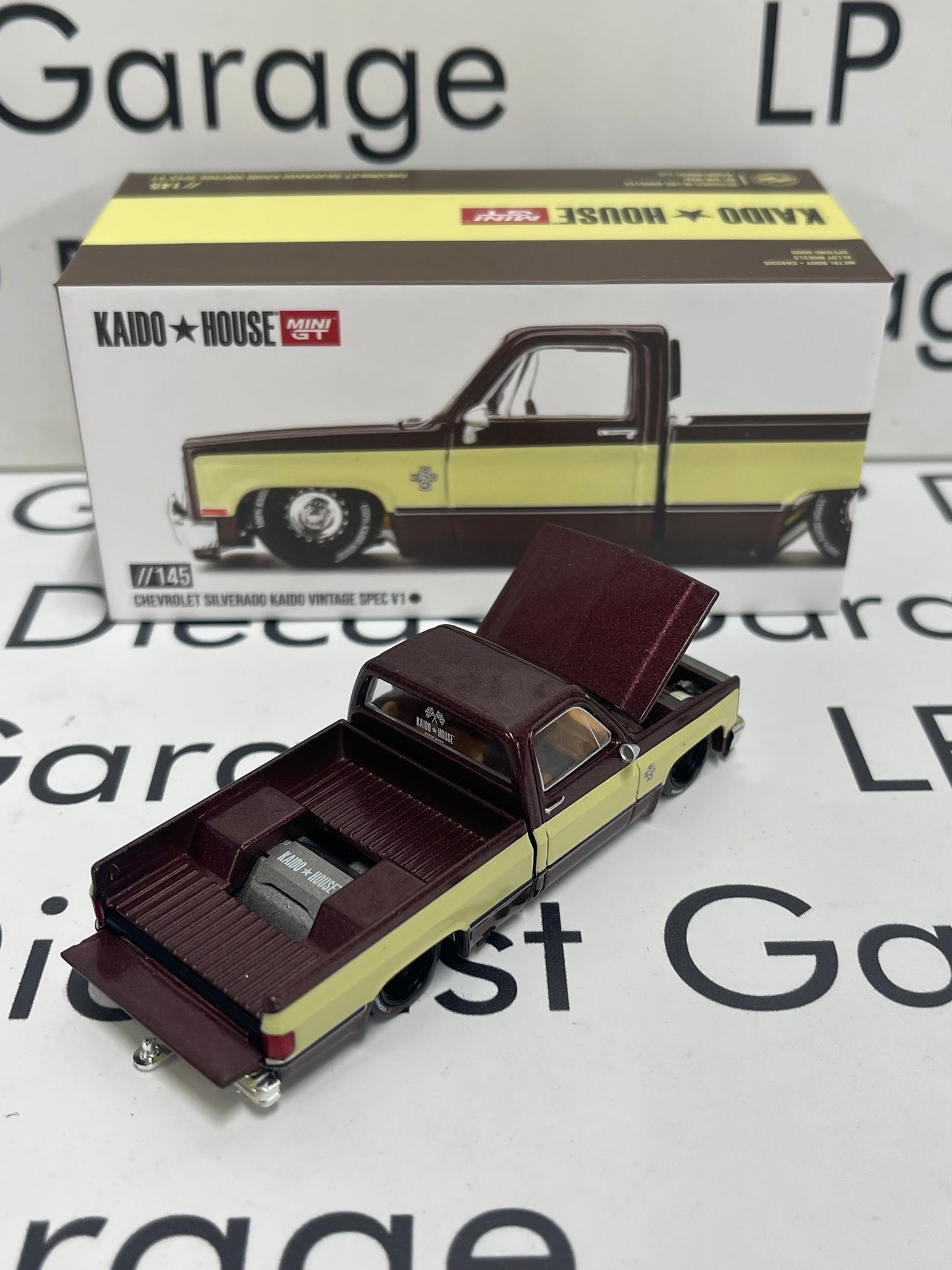 MINI GT KAIDO HOUSE Chevrolet Silverado Vintage Spec V1 Brown 1:64 Diecast