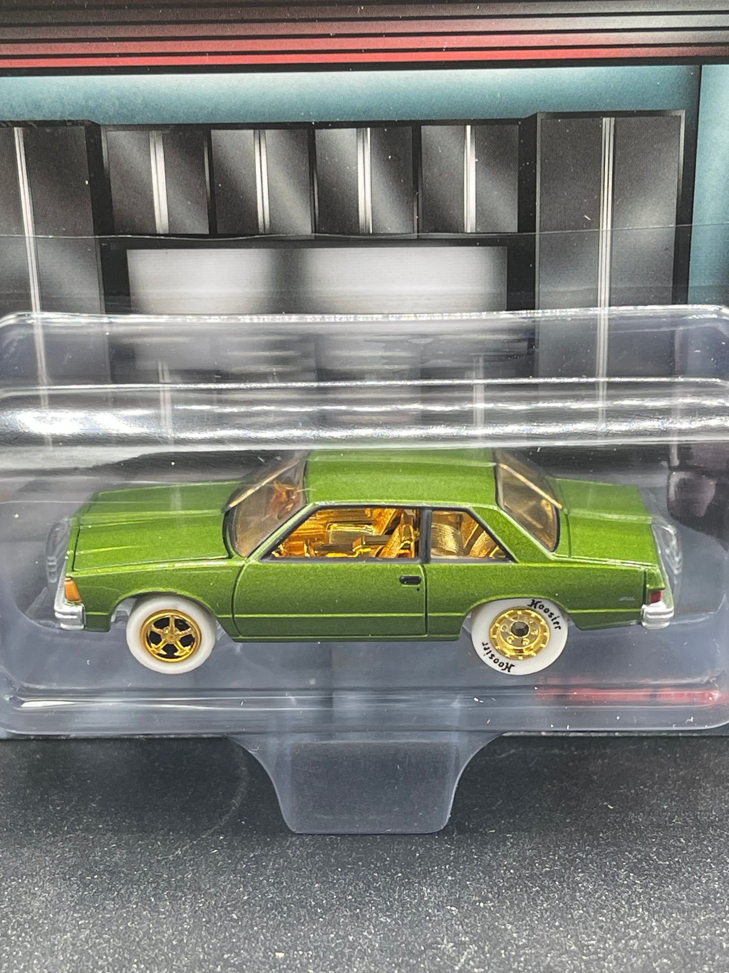 JOHNNY WHITE LIGHTNING Chase 1979 Chevrolet Malibu Jungle Green LP Diecast Garage Exclusive 1:64 Diecast Promo