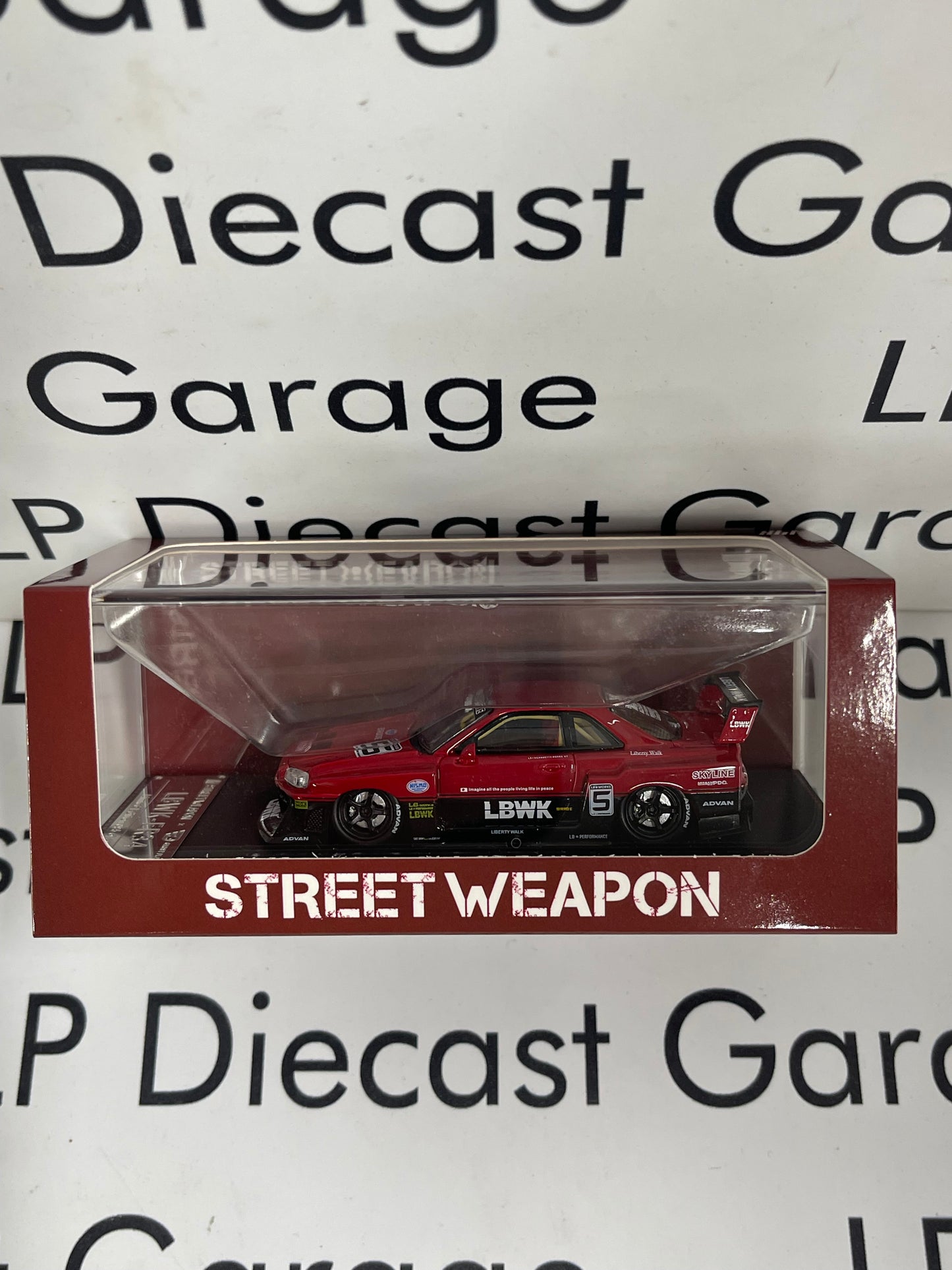 STREET WEAPON Nissan Skyline LBWK-ER34 Red/Black 1:64 Diecast Ghost Player