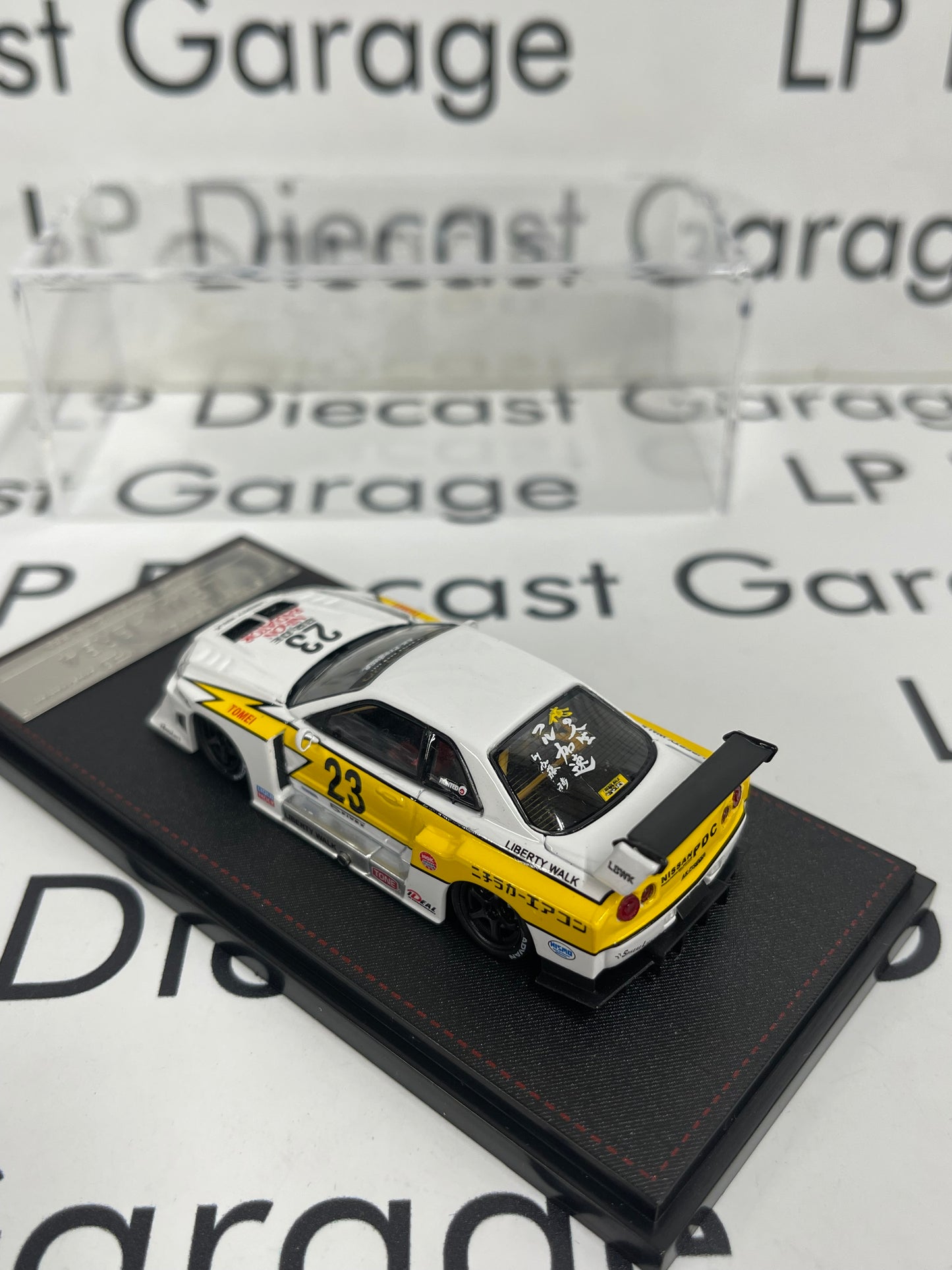 STREET WEAPON Nissan Skyline LBWK-ER34 White/ Yellow 1:64 Diecast Ghost Player