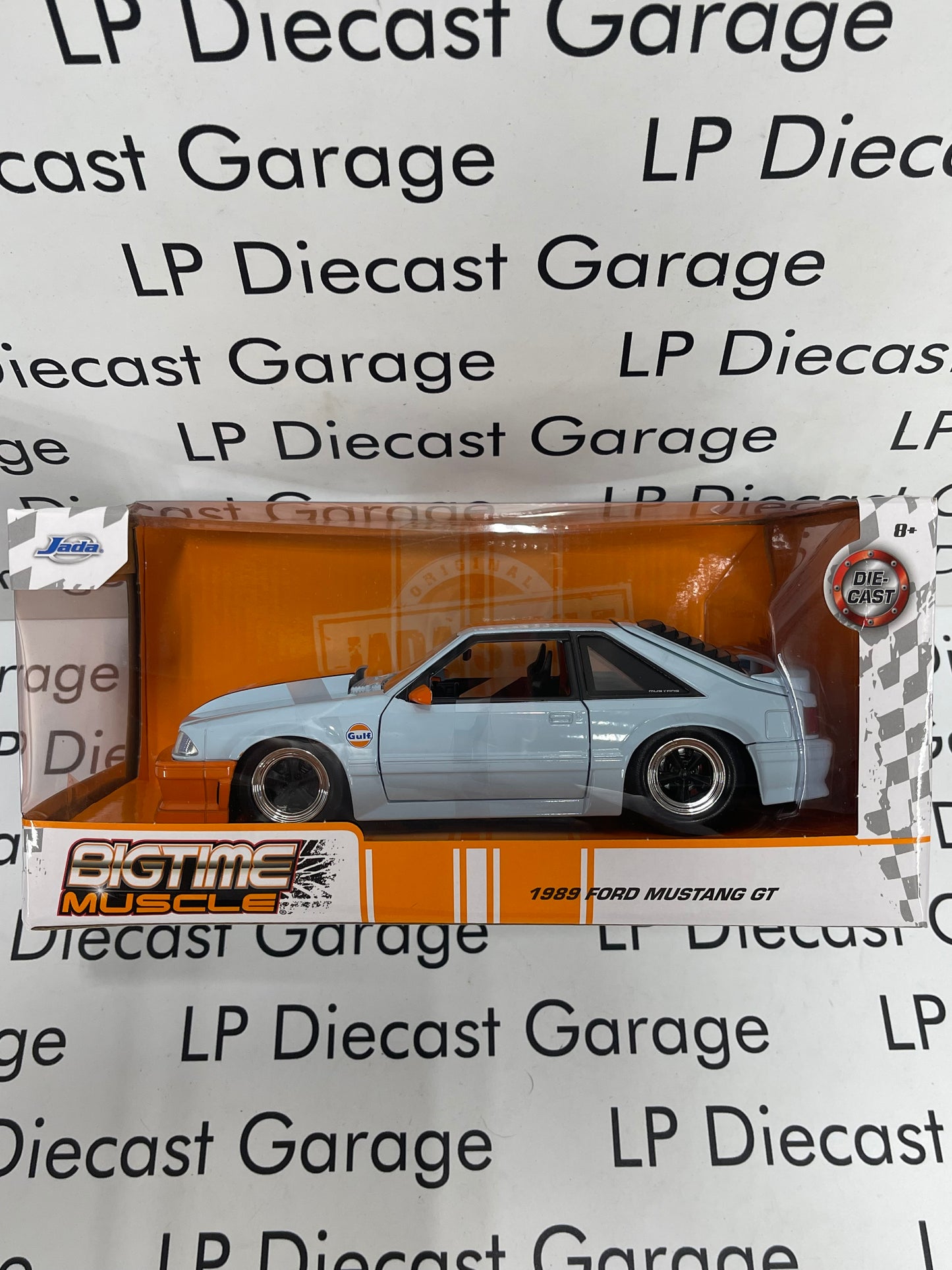 JADA Bigtime Muscle 1989 Ford Mustang GT GULF Baby Blue / Orange 1:24 Diecast