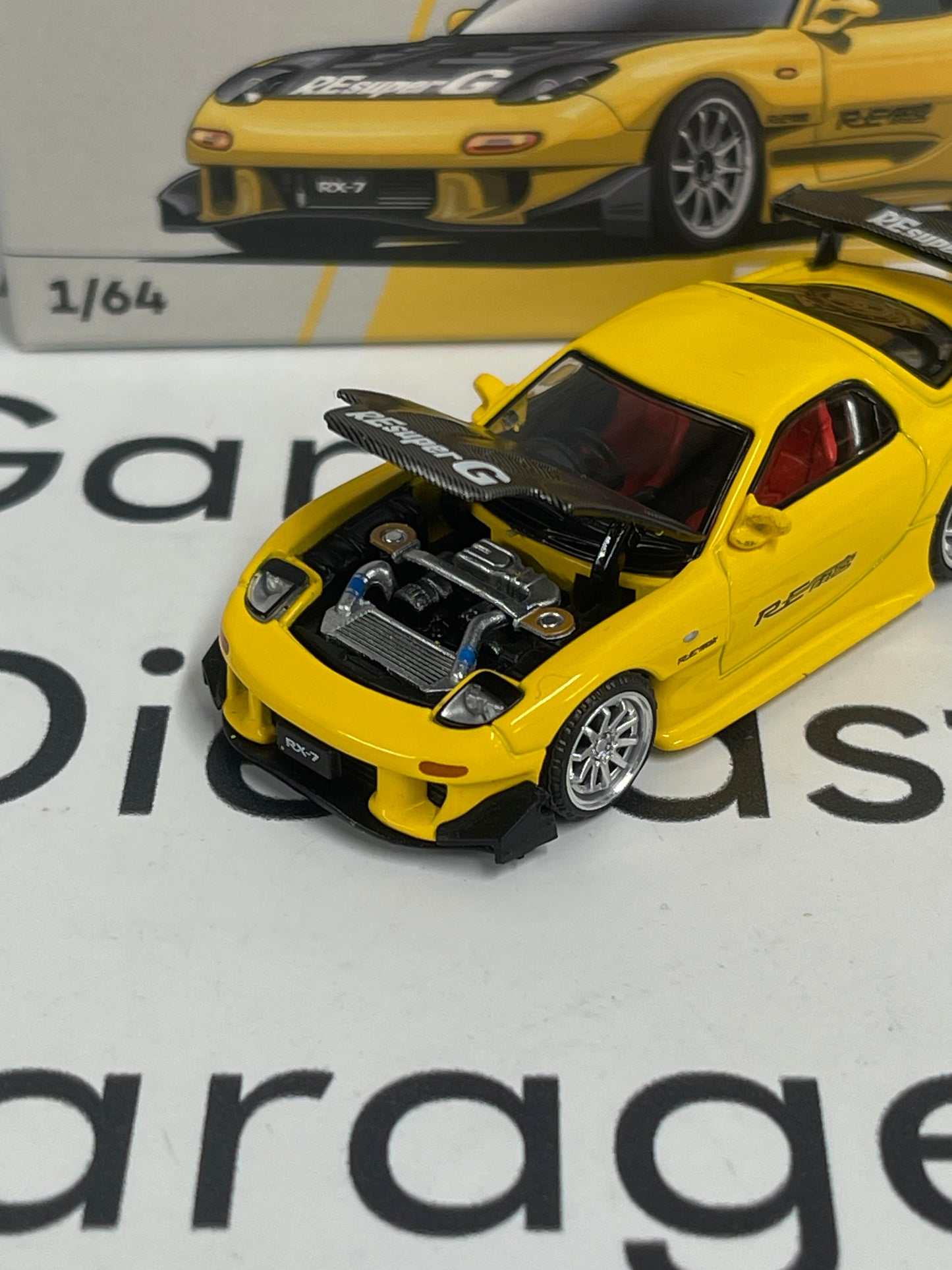 POP RACE Mazda RX7 RE Amemiya Yellow 1:64 Diecast PR64-0116