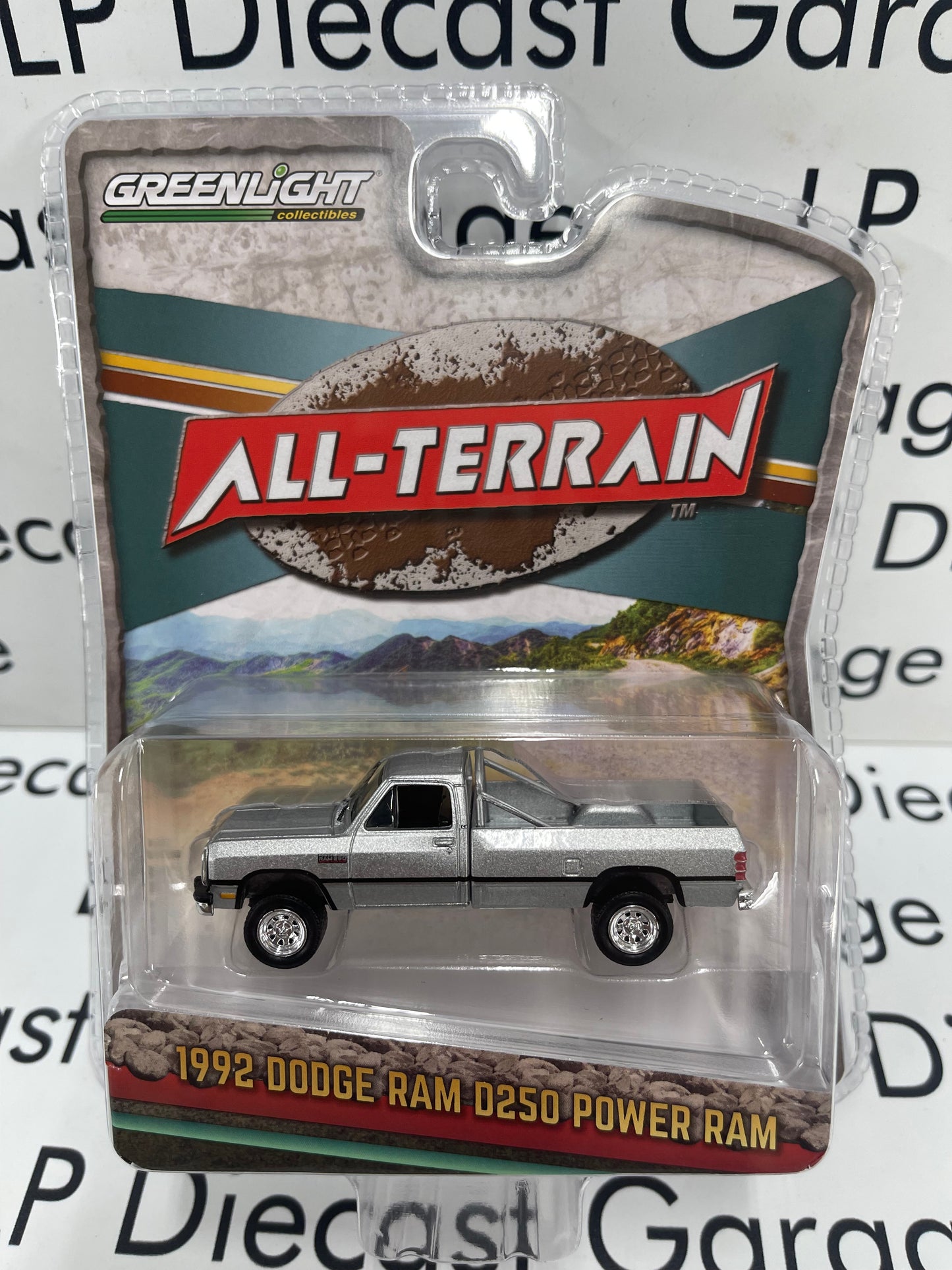 GREENLIGHT 1992 Dodge Ram D250 Power Ram Silver All Terrain 1:64 Diecast