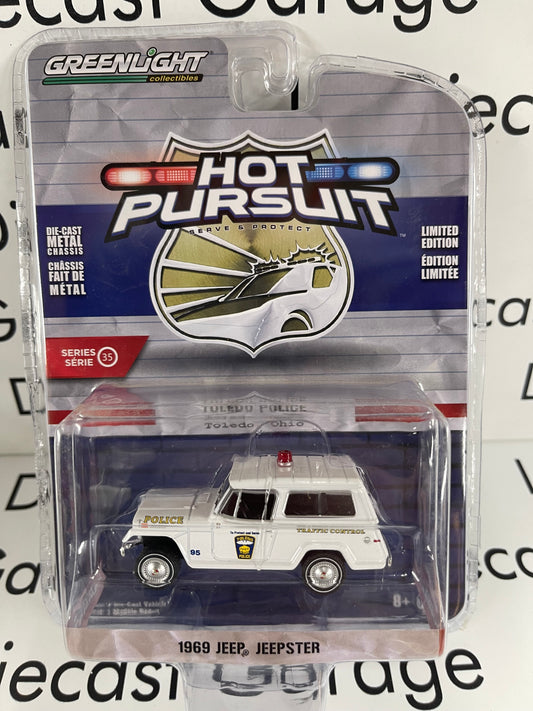 GREENLIGHT 1969 Jeep Jeepster Toledo Ohio Police Car Hot Pursuit 1:64 Diecast