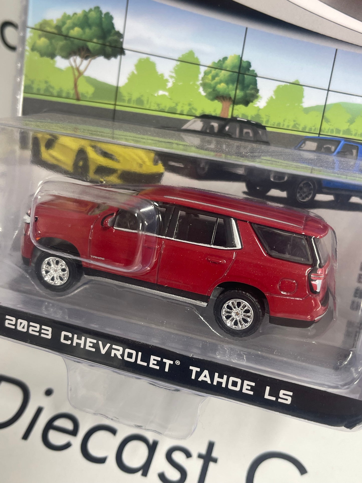 GREENLIGHT 2023 Chevrolet Tahoe LS Radiant Red 1:64 Diecast Showroom